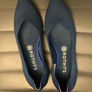 Rothy’s flats in navy